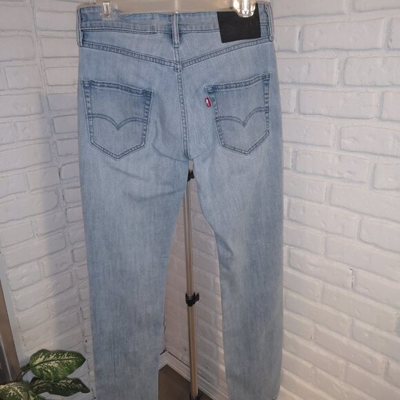 Levi's 511 Commuter Unisex Coolmax 2 Way Stretch Lt Wash Blue Jeans - Picture 2 of 16